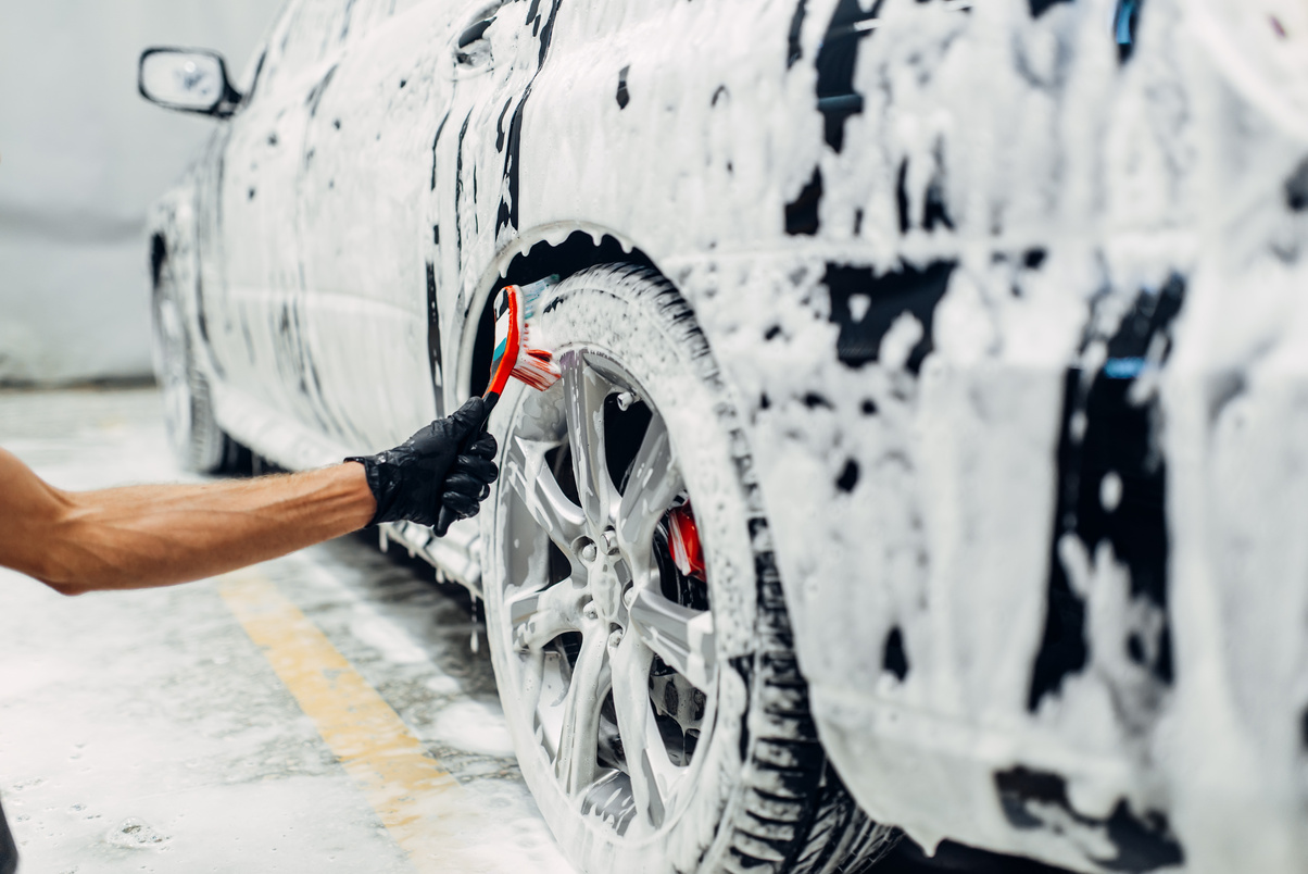 Carwash Service, Washing of Wheels with Brush